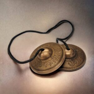Image shows tingsha bell with Om namo shivay, perfect for meditation