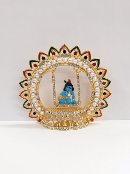 Image of baby Krishna - Laddu Gopal Idol on a Jhula - Swing.