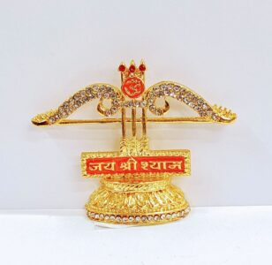 Image of a car dashboard Idol with a symbol and writing Jai Shri Shyam