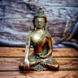 Image of a brass buddha in meditation pose