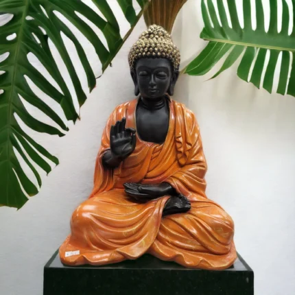 Meditating Buddha statue in a meditation room