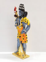 side view Image of a car dashboard Idol of Shiva Standing in color