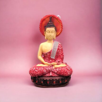 Image of a meditating buddha with red hues