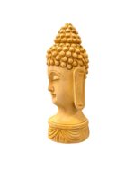 side view Image of a hand carved buddha face statue which is available in Canada and US