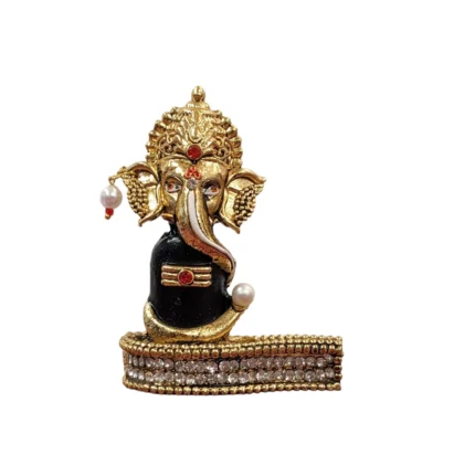 Image of car dashboard idol of Ganesha with shivling