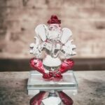 Crystal Red colored Ganesha Car Dashboard Idol in Canada and the US.