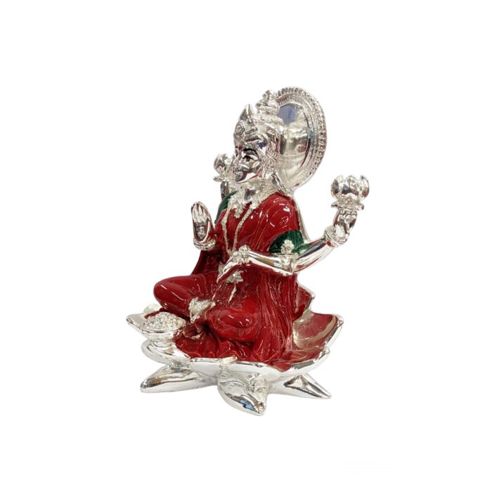 side view Image of a Pure Silver plated Idol of Goddess Lakshmi .