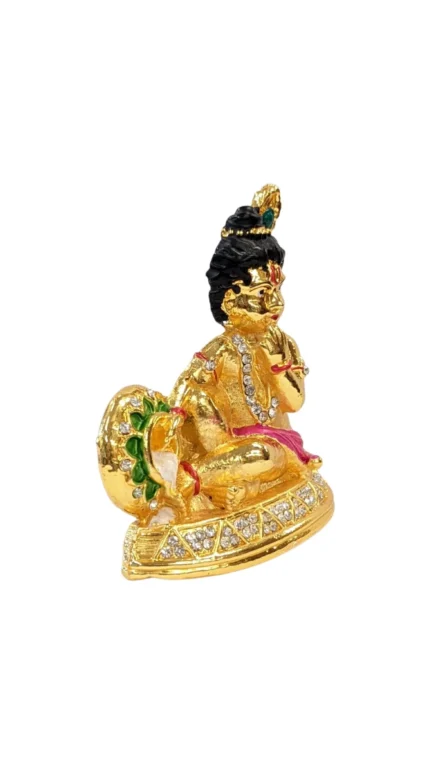 side view Image of krishna makhan chor sitting car dashboard Idol