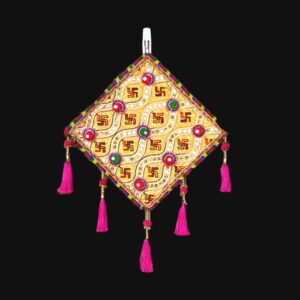 Image of a cream handcrafted kite shaped wall hanging for home decor and Diwali decorations in Canada and the US.