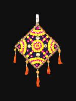 Image of a black and a cream handcrafted kite shaped wall hanging for home decor and Diwali decorations in Canada and the US.