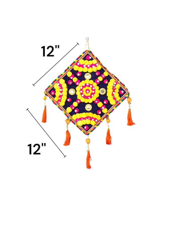 dimensions on the Image of a black and a cream handcrafted kite shaped wall hanging for home decor and Diwali decorations in Canada and the US.