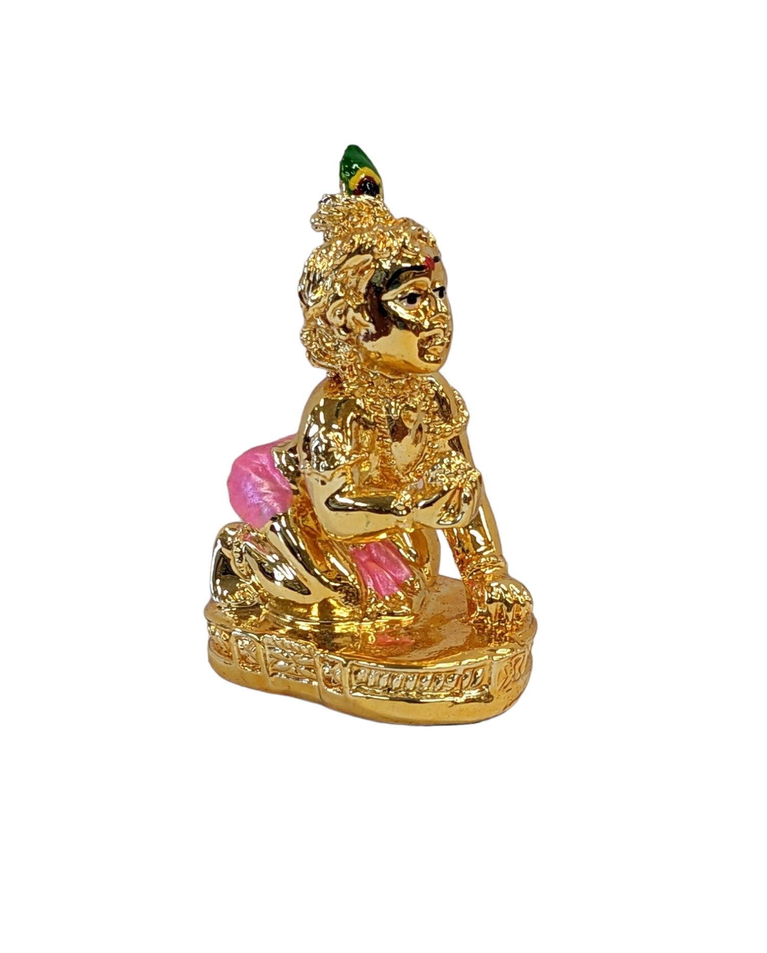 image of a gold plated laddu gopal krishna car dashboard idol