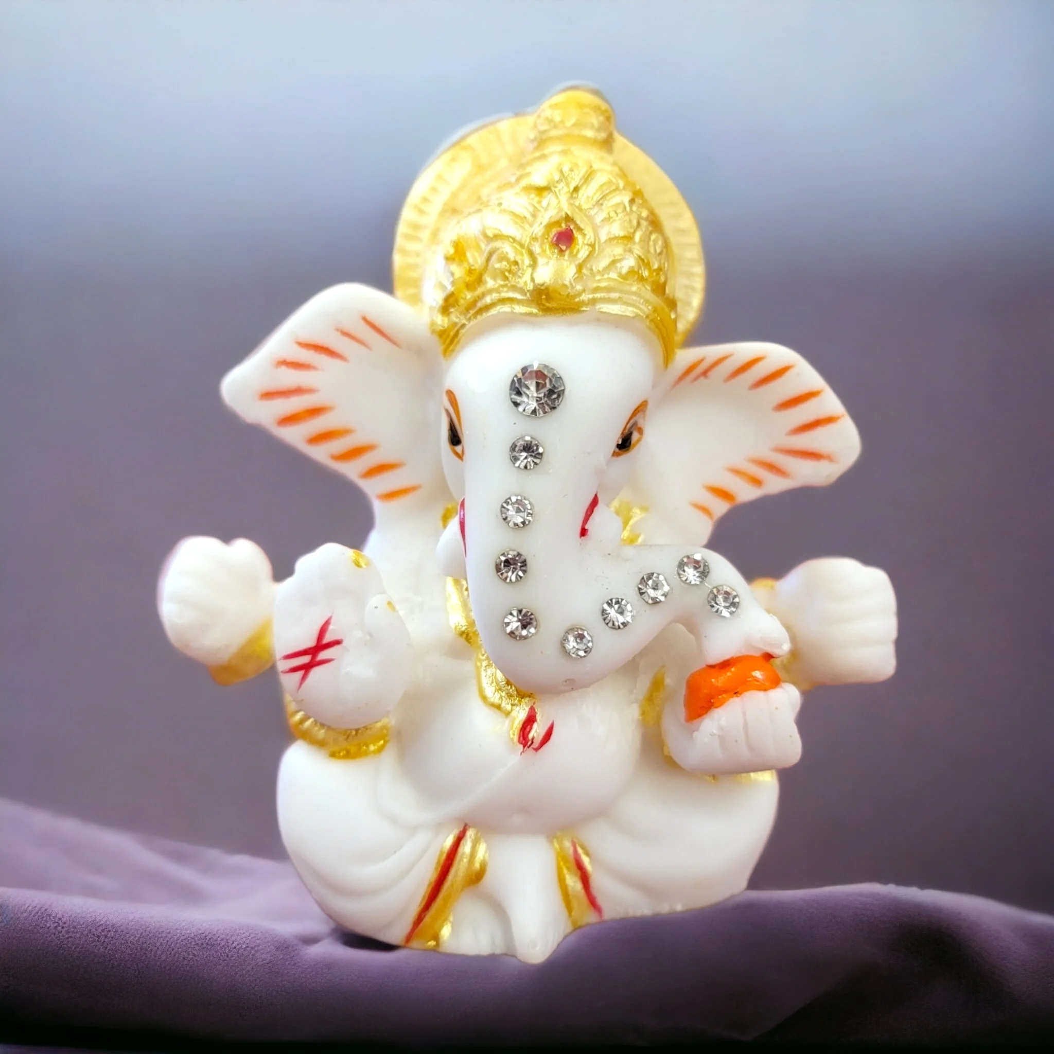 image of premium Ganesha car dashboard statue