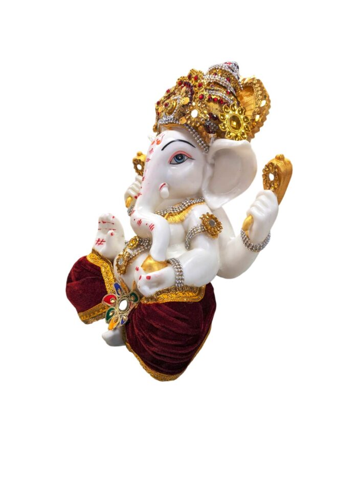 side view Image of a Large Sized Ganesha Idol with colored dhoti and decorations. Perfect Gift for House warming