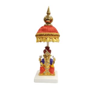 Image of a Car dashboard Idol of Ganesha with a red colored Chattar on top