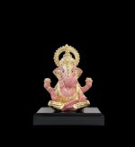 Image of Dugdu Ganesha sitting on platform , Pure Gold plated Car dashboard Idol with black background