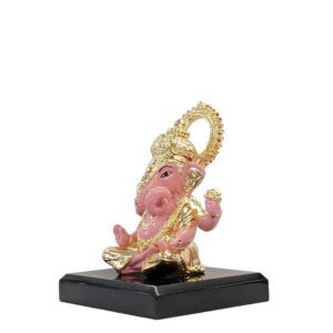 Side view Image of Dugdu Ganesha sitting on platform , Pure Gold plated Car dashboard Idol