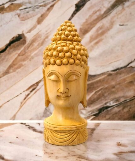 Image of a hand carved buddha face statue which is available in Canada and US