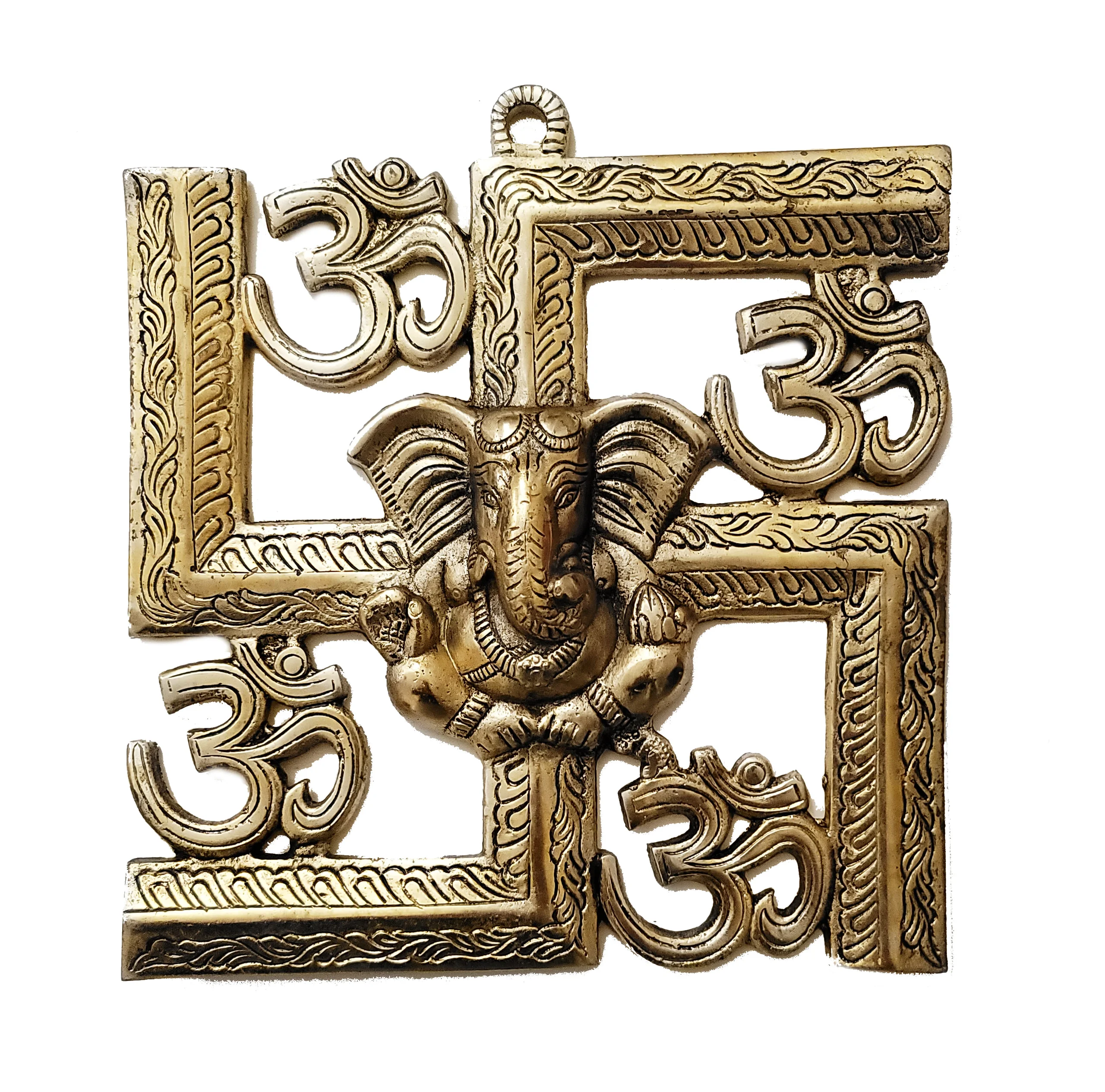 Image of a wall hanging of auspicious swastik with Ganesh and om brass hanging