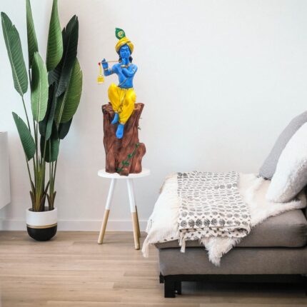 Large krishna statue placed in a living room as decor. This sized statue are great ideas as gift