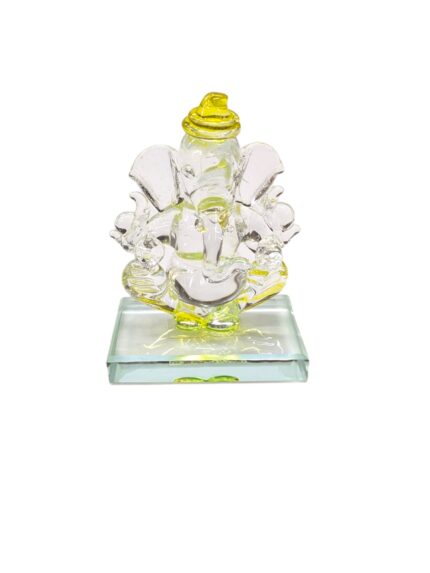 Image of a yellow crystal car dashboard Idol of Ganesha