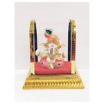 image of ganesha statue in a acrylic dome for car dash board statue