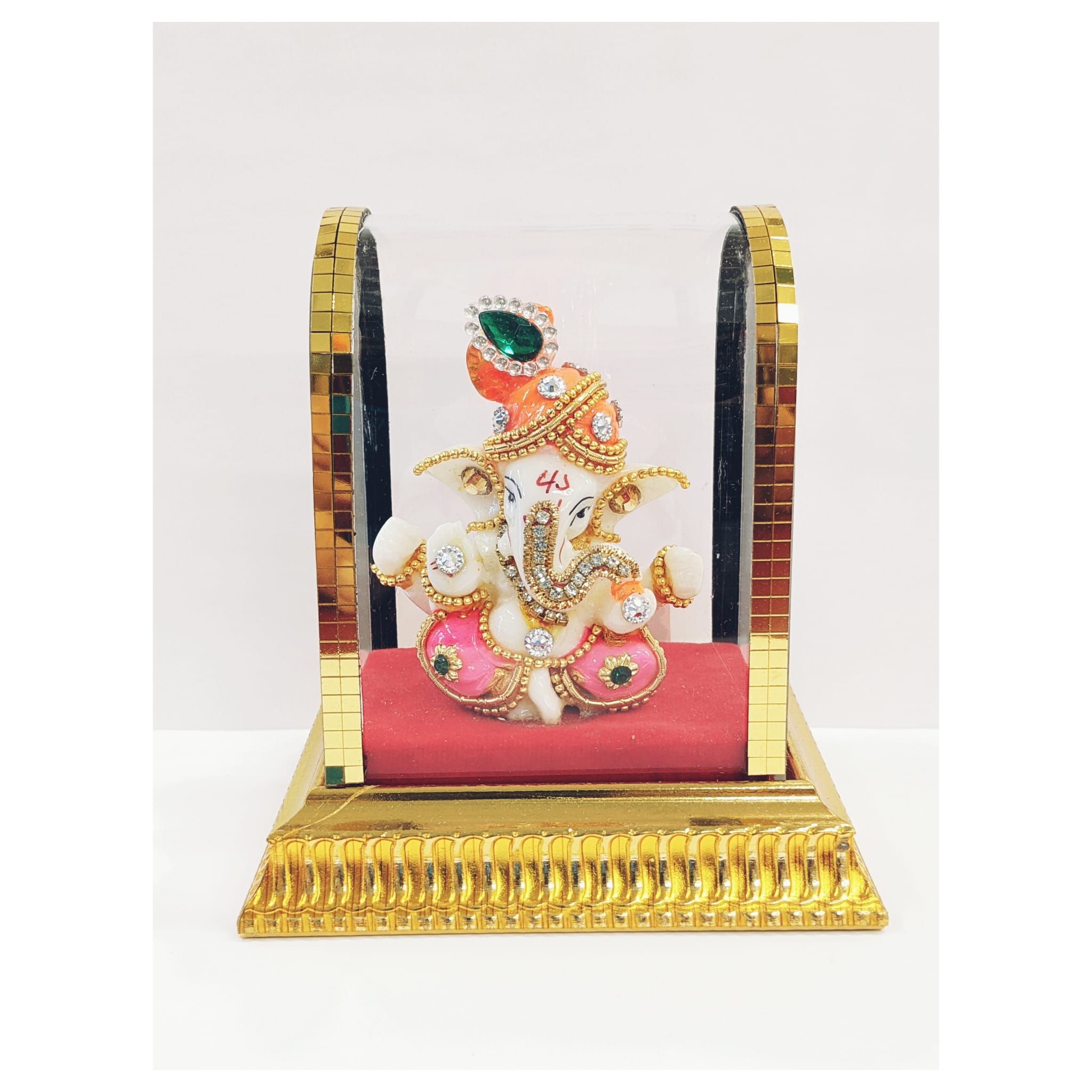 image of ganesha statue in a acrylic dome for car dash board statue