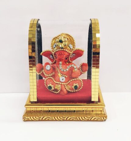 image of an Ganesha Idol in a acrylic dome