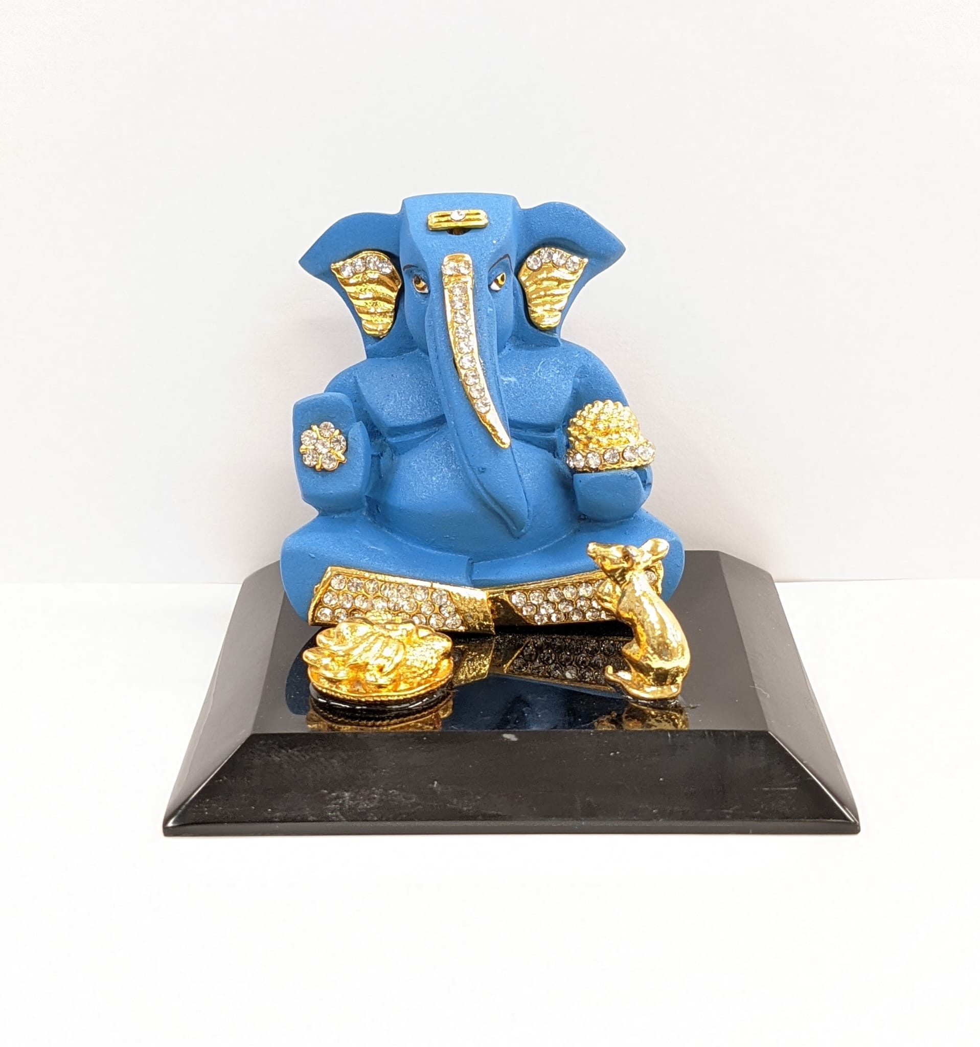 Premium statue of Ganesha on a platform , Perfect for gifts and home mandir
