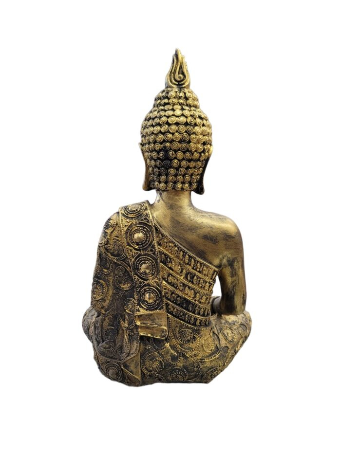 Image of a golden oxidized meditating Buddha idol
