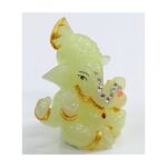 side view - image of a glow in dark ganesha Idol for your car dashboard