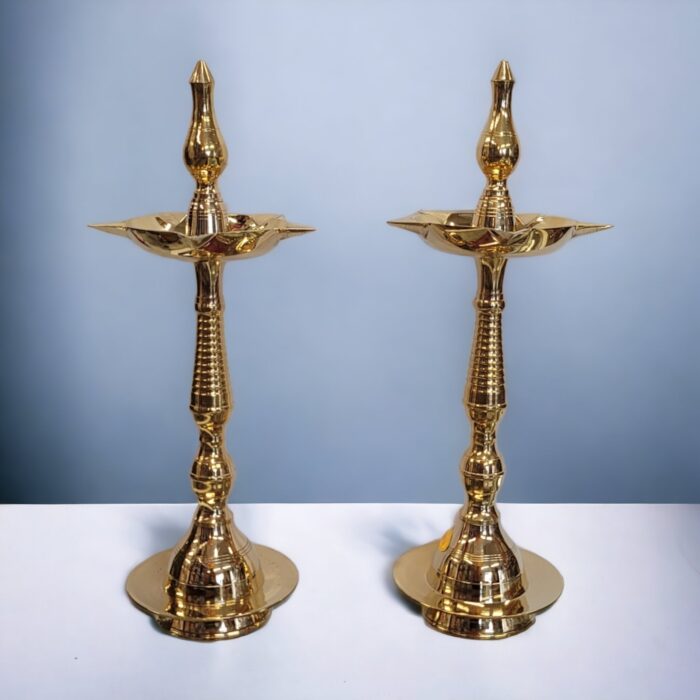 Pair of Brass Kerala Lamps available for sale in Canada and the US.