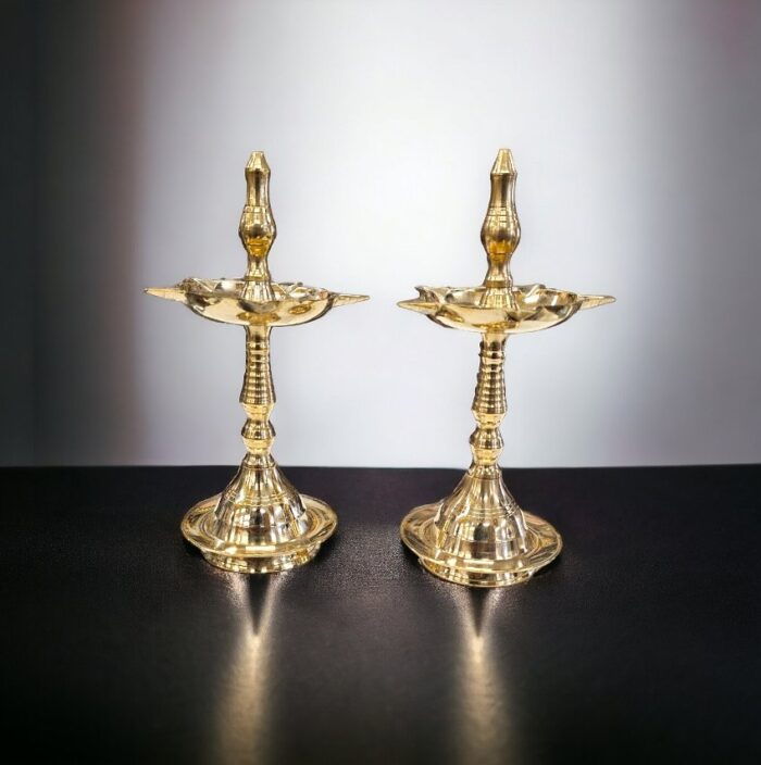 Pair of small Brass Kerala Lamps available for sale in Canada and the US.