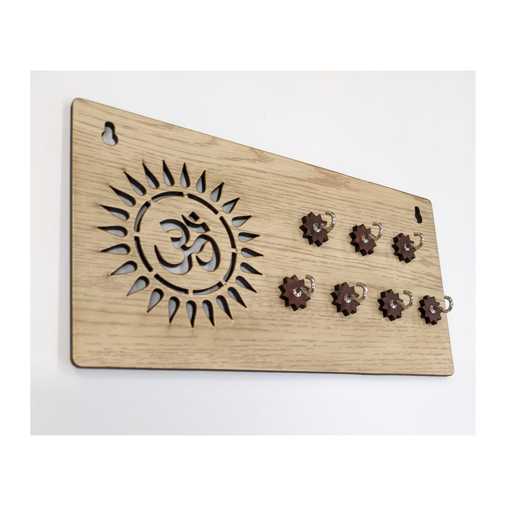 side view image of wooden Key chain holder with Om symbol - Cream colored