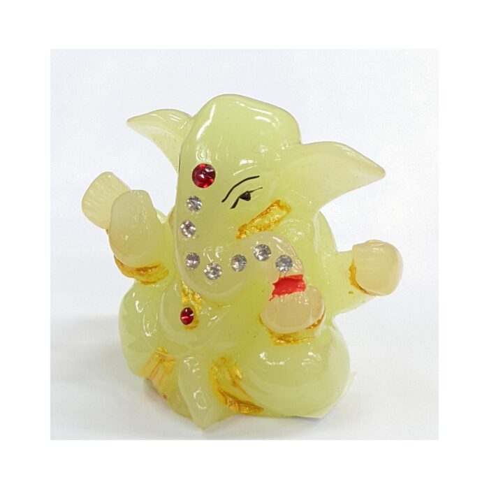 side view Image of a glow in the dark Car dashboard Idol of Ganesha