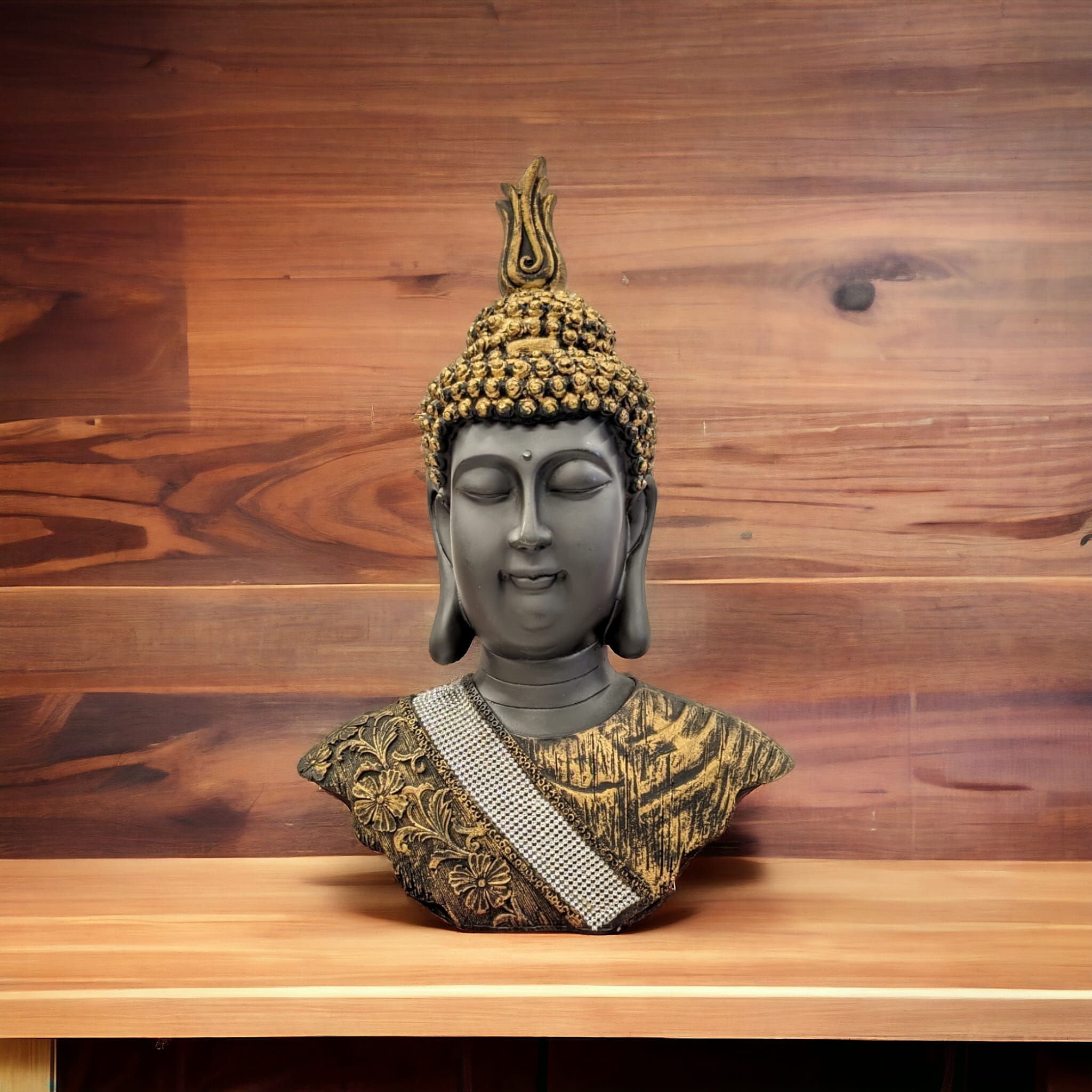 Image showing a Large Buddha face statue placed on wooden platform in a living room.