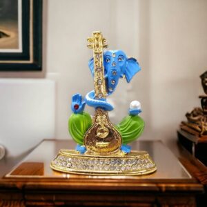 Image of Ganesha Car dashboard Idol holding a veena - blue
