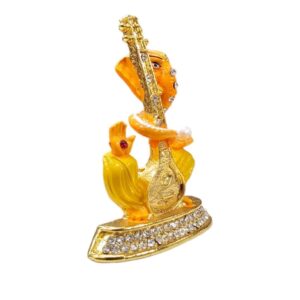Image of Ganesha Car dashboard Idol holding a veena - orange