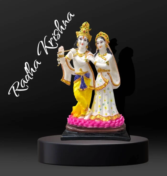 Large idol of Radha Krishna made out of marble dust poly stone with golden hues accent.