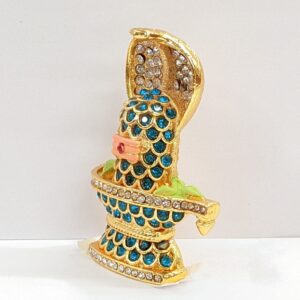 side view Image of Car dashboard Idol of Sheshnaag on shivling