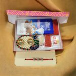 Image of Sher Rakhi with Lindt Chocolate hamper , Send Rakhi to Canada from India at lowest prices using krishnacollections website