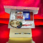 Evil eye rakhi hamper with moli, tilak and platter for quick delivery in Canada and the US