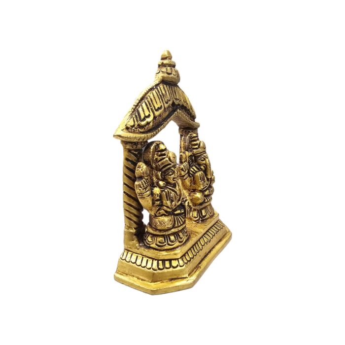 side view Image of a Brass Lakshmi and Ganesh Idol placed on a platform in a Home Mandir