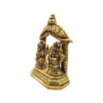 other side view Image of a Brass Lakshmi and Ganesh Idol placed on a platform in a Home Mandir