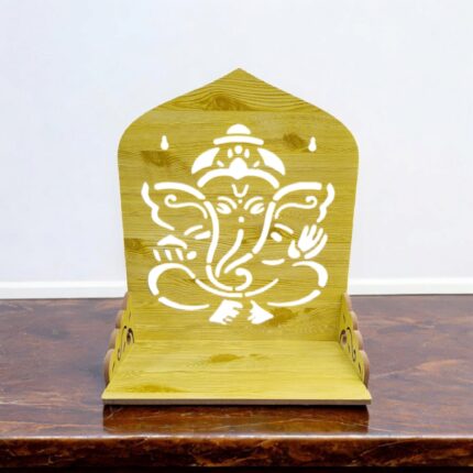 Image of a wooden Mandir , which is flexible and foldable . Comes with a backdrop of Ganesh