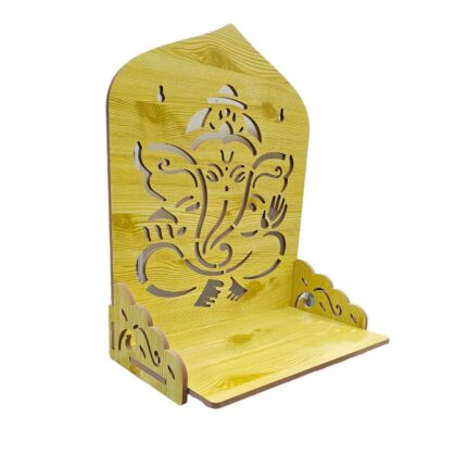 Image of a wooden Mandir , which is flexible and foldable . Comes with a backdrop of Ganesh