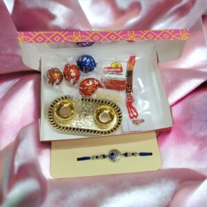 Evil eye Rakhi hamper - Lindor Chocolate Rakhi Hamper . Send rakhi to Canada . Send Rakhi to USA
