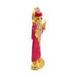 Buy Sai Baba car dashboard idol in Canada and US. Red Sai Baba idol on a white background with a side view.