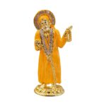 Buy Sai Baba car dashboard idol in Canada and US. Orange Sai Baba idol on a white background.