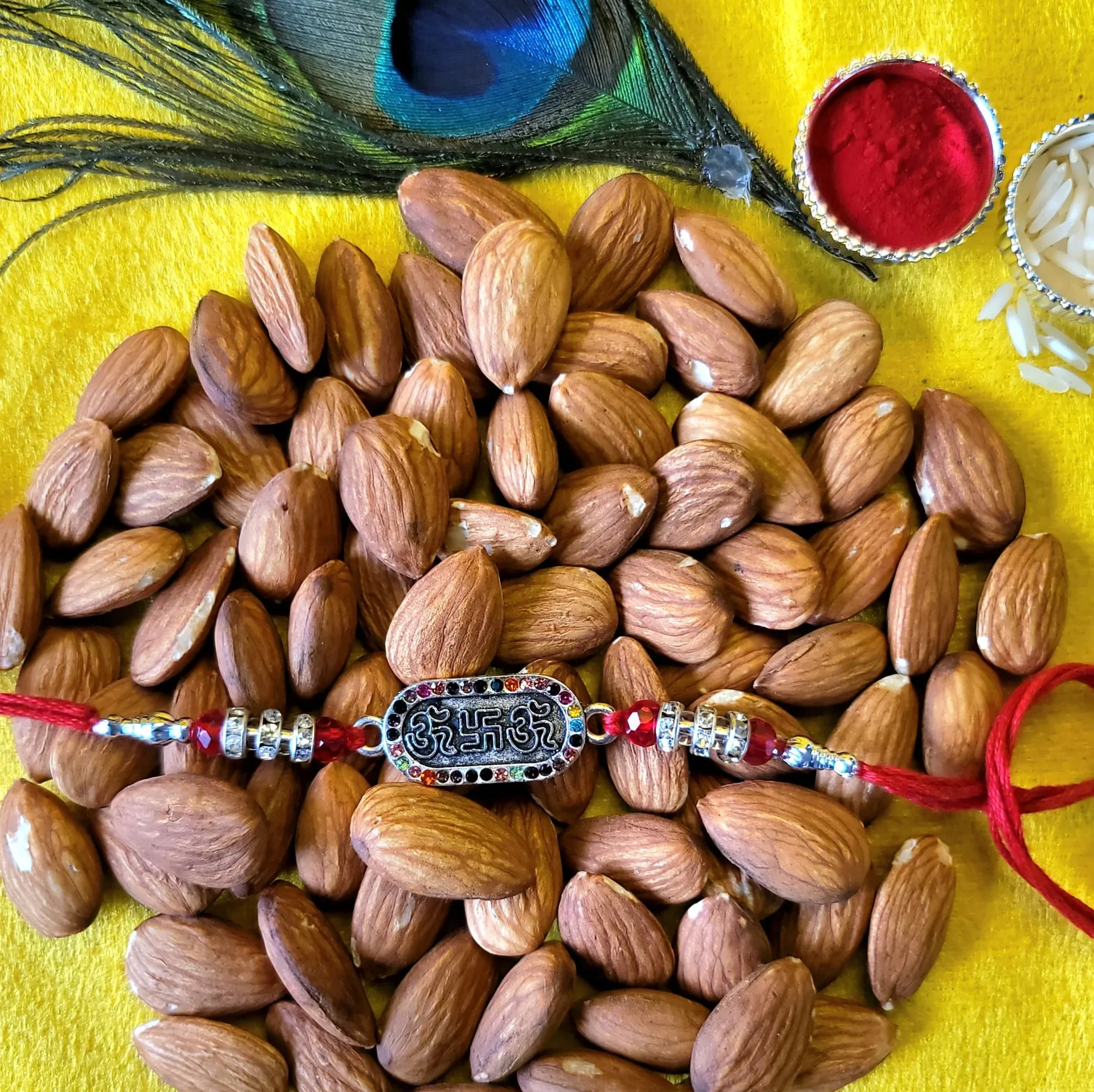 om swastik 2 Om emblem rakhi with almonds hamper in Canada and the USA